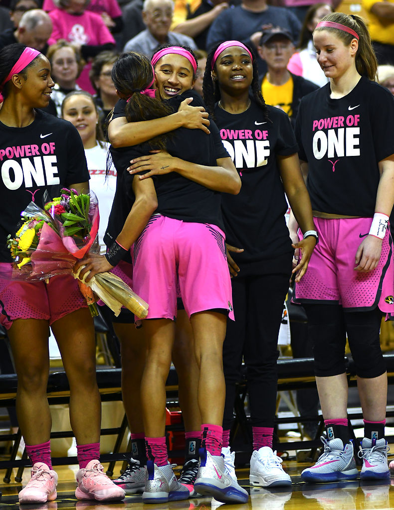 Missouri junior Ladazhia Williams hugs senior Jordan Roundtree